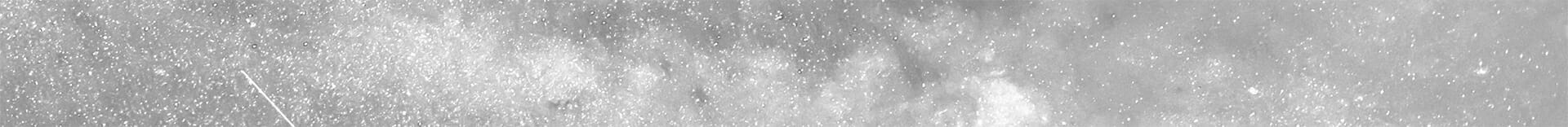 Image of a banner with white specks on a grey background