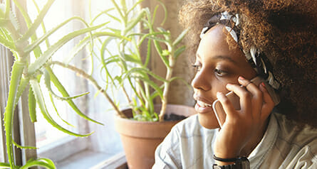 Image of a woman speaking with a Care Specialist at Navigator to explore options for substance use treatment